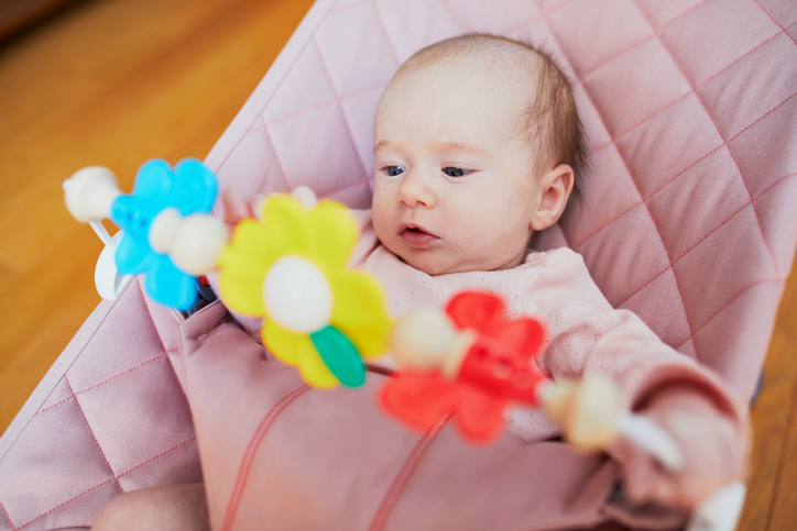 A baby in a rocker