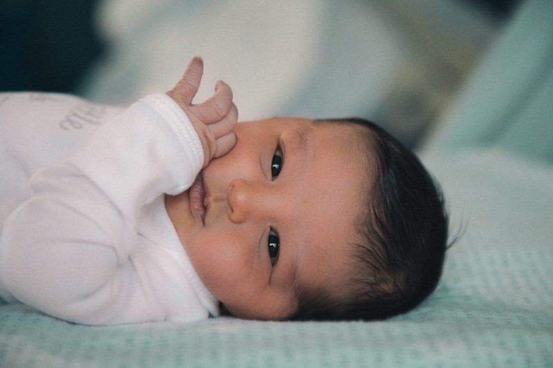 how to get your baby to sleep on their back