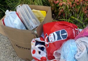 Collection of bags and boxes clothing donation e1754530046403