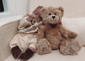 Zayd with teddy bear honouring twin brother Jett IMG 4522 COLOURTONE e1787211643883