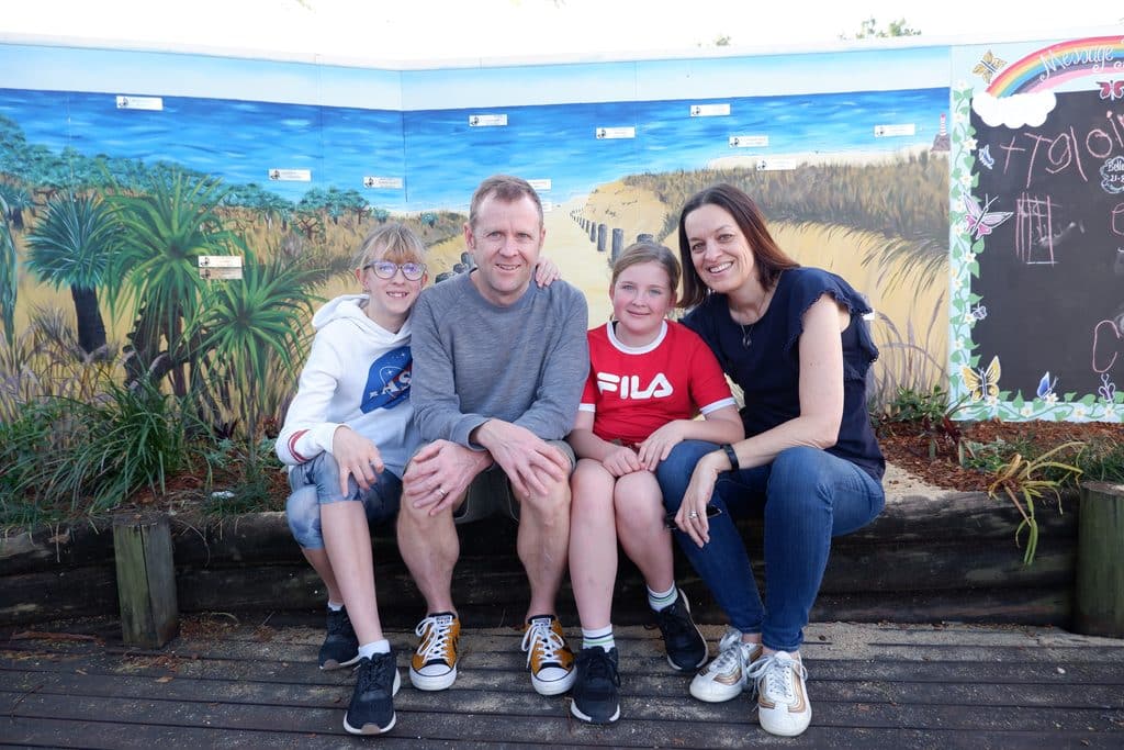 Annalise and family Annalise with her parents and sister Isabella, a family who remembers Nicholas after sibling loss