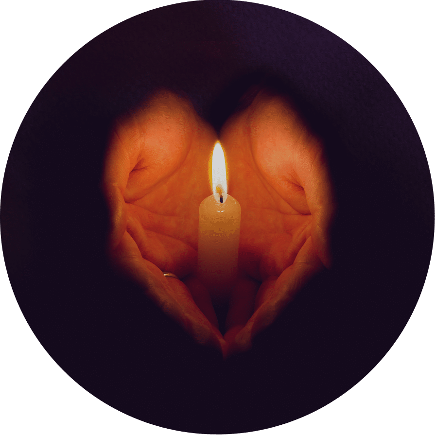 Hands holding a candle in celebration of PAIL